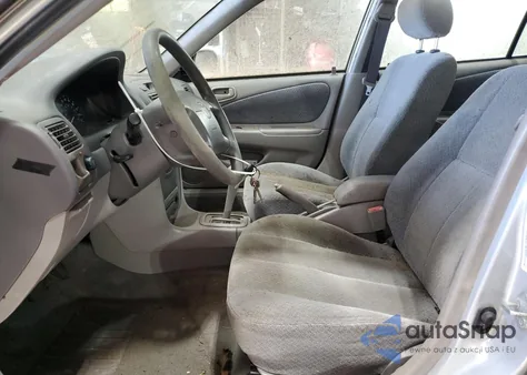 2000 Toyota Corolla Ve z USA, uszkodzony, nr VIN 2T1BR12E1YC313038